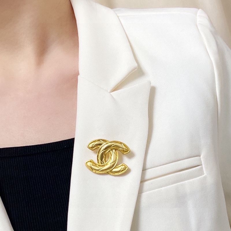 Ch**el brooches